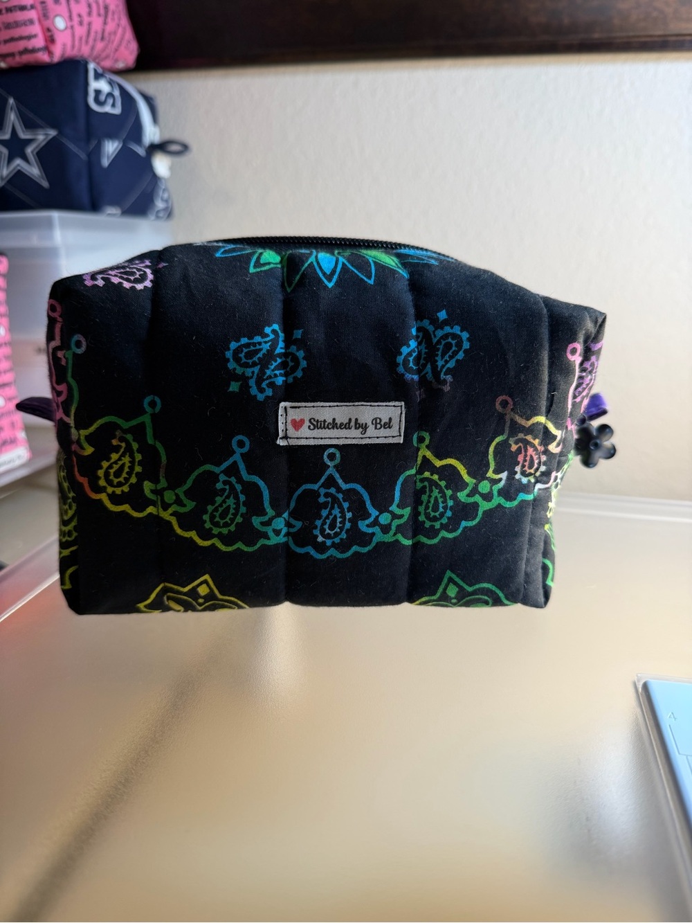 Stitched by Bel Black Quilted Travel Pouch with Rainbow Print